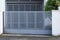 Grey gate perforated sheet home aluminum portal of suburb house in street view