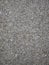 Grey granite textured background with copy space