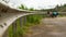 Grey guardrail on a rural roadside with a nice perspective