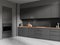 Grey kitchen interior with shelves and kitchenware, cooking corner
