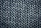 Grey knitting wool texture background