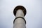 Grey metal pipe chimney against the gray sky