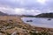 Grey and Morning of cloudy spring in Lake Montmalus, Encamp, Andorra