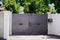 Grey panel brut steel metal house portal of a traditional european house