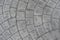 Grey pavement in a pattern in an european city. Tile. Design, texture, wallpaper backdrop concept