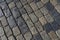 Grey paving stone texture on Red Square in Moscow, pedestrian walkway. Top view. Cement brick squared stone floor