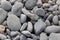 Grey pebbles on the beach