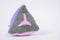 Grey and pink soft textile washable snuffle toy in shape of pyramid for hiding treats for dogs nose work, white