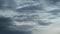 Grey rainy stormy clouds . Time lapse of dramatic moving dark clouds. Spectacular cloudscape