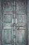 Grey retro style wooden door with rusty latch background, textur