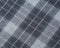 Grey scottish checked wool fabric texture background