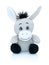 Grey smiling donkey plushie toy isolated on white background with shadow reflection. African wild plaything.