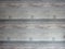 Grey striped distressed wood effect wallpaper