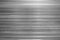 The grey structured texture background of a metal iron