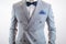 Grey suit plaid texture, bowtie, pocket square