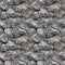 Grey texture of a plastered wall seamless pattern design. Old rough plaster background. Cement concrete background.