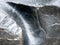 Grey tones closeup of a rock polished to show texture background trail of time grand canyon