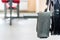 Grey towel hangs on barbell in gym