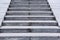 Grey urban stairs of a pedestrian bridge