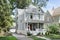 A grey and white renovated Victorian home.