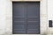 Grey wooden front door of street restored house entrance wood classic gate