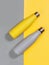 Grey and yellow reusable insulated bottles on grey and yellow background