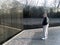 Greyhaired Man Standing in Front of Vietman Memorial in Washington DC March 2007