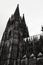 Greyscale shot of the exterior facade of the Cologne Cathedral in Cologne, Germany