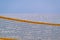 Grid of beach volleyball closeup and sea