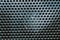 Grid pattern surface. dusty speaker mesh texture. perforated plastic. abstract background