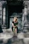 Grief: Woman Sitting on Mausoleum Steps