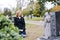 Grieving woman in cemetery