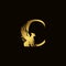 Griffin silhouette inside gold letter C. Heraldic symbol beast ancient mythology or fantasy. Creative design elements for logotype