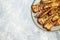 grill eryngii slice Oyster mushroom King mushrooms Eringi on a wooden board on a light background. banner, menu, recipe place for