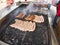 Grill frying fresh meat barbecue sausages, BBQ picnic sandwich store