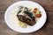 Grill sea bass fillets with crushed potatoes