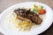 Grill sea bass fillets with crushed potatoes