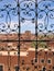 Grille gate with a red fort