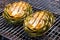 grilled artichokes on a metallic surface