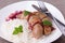 Grilled bavarian sausages with rice and mint on white dish