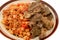 Grilled beef meat kofta and liver with classic ring pasta macaroni with tomato sauce and pieces, garlic, onion, spices, oil and