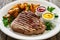 Grilled beef sirloin steak with baked potatoes on wooden table