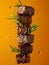 Grilled Beef Steak Cubes Suspended in Mid air with Fresh Rosemary and Droplets on Warm Amber Backdrop