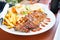 Grilled beef steak with salad on a plate