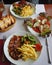 Grilled beefsteak, french fries and vegetables