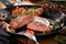 Grilled Black Angus Steak Striploin on frying cast iron Grill pan on dark background.