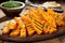 grilled butternut squash pieces on a wooden table