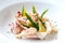 Grilled calamari with green asparagus.