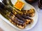 Grilled calcots with romesco sauce