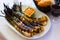 Grilled calcots with romesco sauce